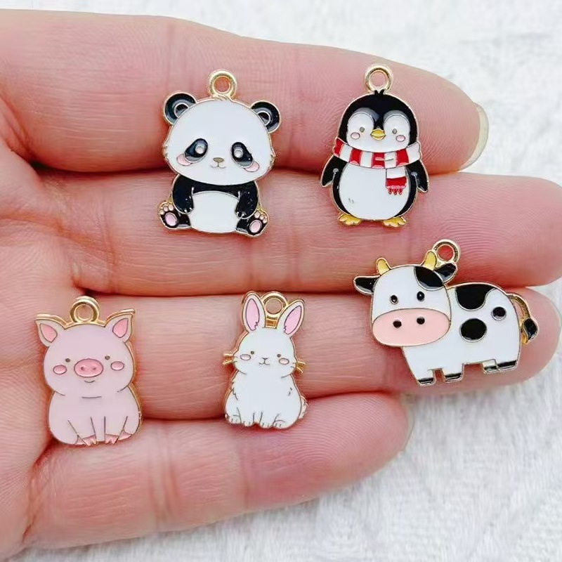 10 Stück Cartoon Pinguin Panda – Jewelry Making Pendants Bewertung und Preis